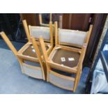 A SET OF SIX LIGHT BEECH WOOD DINING CHAIRS WITH UPHOLSTERED BACKS AND SEATS