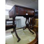 A MAHOGANY OCCASIONAL TABLE IN THE STYLE OF A REGENCY SOFA TABLE, WITH INLET LEATHER TOP