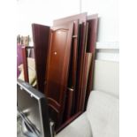 A MAHOGANY SEMI-FITTED WARDROBE IN SIMILAR TASTE ENCLOSED BY THREE MOULDED PANEL DOORS, 4?6? WIDE