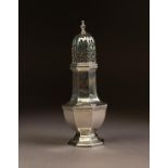 GEORGE V SILVER PEDESTAL SUGAR CASTOR BY WALKER & HALL, of octagonal form with scroll pierced pull-