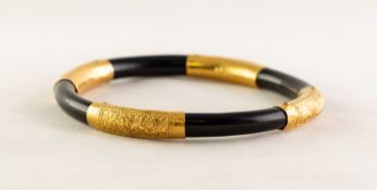 ANTIQUE CHINESE BLACK LACQUERED WOOD BANGLE applied with four Chinese gold coloured metal bands,