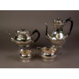 LATE VICTORIAN SILVER FOUR PIECE TEA AND COFFEE SET BY CHARLES STUART HARRIS, of oval part fluted