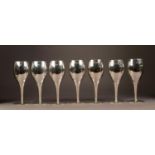 GARRARD & Co Ltd SET OF SEVEN SILVER GOBLETS, including: A CASED SET OF SIX, each of tulip form with