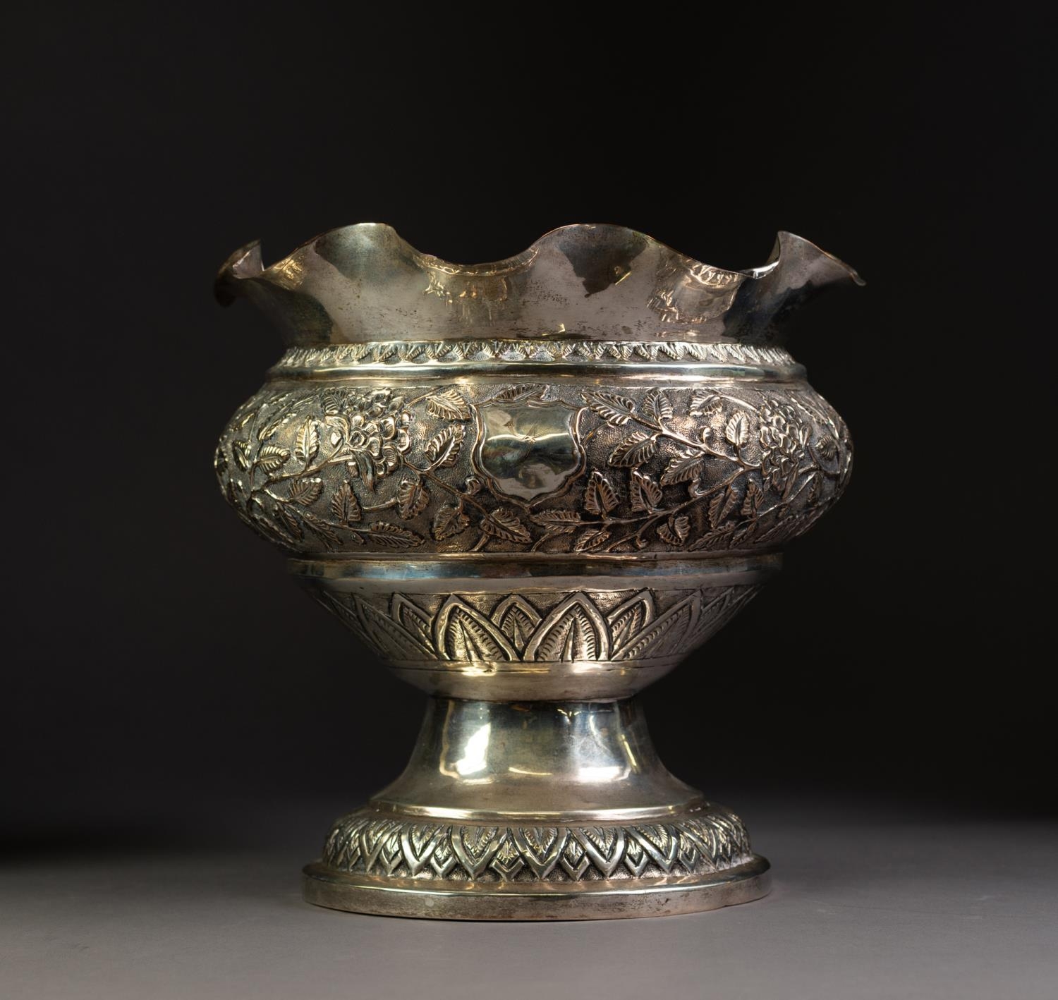 EASTERN SILVER COLOURED METAL PEDESTAL DEEP BOWL, with plain wavy top, the bulbous body repousse - Image 2 of 2