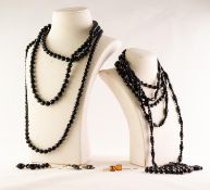 FOUR JET FACETED BEAD NECKLACES, a similar BRACELET and a pair of pendant EARRINGS; a pair of JET