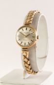 LADY'S ROTARY 9ct GOLD SWISS WRISTWATCH with 21 jewels mechanical movement, circular silvered dial