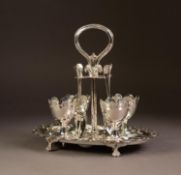 ELECTROPLATED FOUR PERSON EGG CRUET, of oval form with pierced and scalloped border, paw feet and