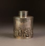 GEORGE V EMBOSSED SILVER TEA CADDY RETAILED BY FINNIGANS OF MANCHESTER, of cylindrical form with