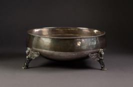 EARLY 20th CENTURY PLANISHED SILVER CIRCULAR BOWL with cabled rim, raised on three winged lion-