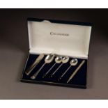 SET OF THREE BLACK BEAN TOPPED SILVER COFFEE SPOONS, Birmingham 1924, together with a SILVER