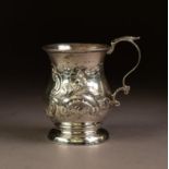 LATE VICTORIAN EMBOSSED SILVER CHRISTENING MUG BY JOHN & WILLIAM DEAKIN, of baluster form with