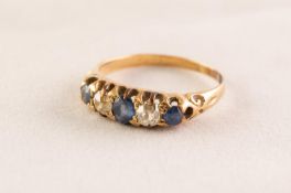 UNMARKED GOLD RING set with three sapphires and two old cut diamonds, 3.2 gms gross