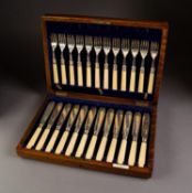 EARLY 20th CENTURY OAK CASED SET OF TWELVE SILVER FISHKNIVES AND FORKS, with bone handles, Sheffield