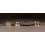 FOUR SILVER NAPKIN RINGS, comprising: A PAIR, Birmingham 1923, ANOTHER, octagonal, marks rubbed