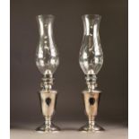 PAIR OF GORHAM ELECTROPLATED OIL HURRICANE LAMPS WITH CUT GLASS SHADES, each of slender campana