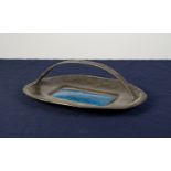 ARCHIBALD KNOX FOR LIBERTY, ENAMELLED PEWTER CAKE BASKET, of rounded oblong form with central
