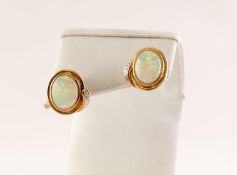PAIR OF 18ct GOLD EARRINGS each set with an opal and two tiny cut diamonds (2)