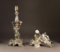 ELECTROPLATED FIGURAL TABLE LAMP, cast with a putti supporting a large leaf above his head, and