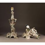 ELECTROPLATED FIGURAL TABLE LAMP, cast with a putti supporting a large leaf above his head, and