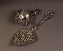 CAST DUTCH SILVER TART SERVER OF TYPICAL FORM, having finial depicting milk maid with yoke and