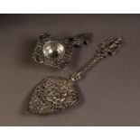 CAST DUTCH SILVER TART SERVER OF TYPICAL FORM, having finial depicting milk maid with yoke and