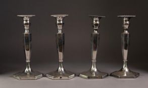 PAIR OF INTER-WAR YEARS WEIGHTED SILVER CANDLESTICKS of hexagonal baluster form, plain save for