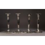 PAIR OF INTER-WAR YEARS WEIGHTED SILVER CANDLESTICKS of hexagonal baluster form, plain save for