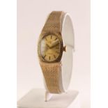 LADY'S ROTARY 9ct GOLD SWISS BRACELET WATCH with 21 jewels movement, silvered oval dial with batons,