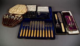 CASED SET OF SIX ELECTROPLATED FISH KNIVES AND FORKS; a cased pair of FISH SERVERS; a cased set of