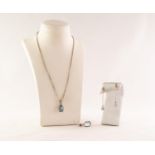 SILVER AQUAMARINE SET OBLONG PENDANT, on silver fine chain necklace; an oval facet cut aquamarine