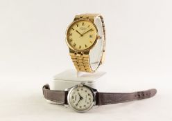 GENT'S QUARTZ WRISTWATCH with circular roman dial, centre seconds hand and date aperture, gold