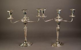PAIR OF ELECTROPLATED THREE LIGHT, TWIN BRANCH CANDELABRA, each with reeded, outswept arms,