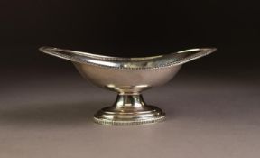 EDWARDIAN SILVER PEDESTAL SWEETMEAT DISH, oval and boat shaped with flat border, egg and dart