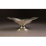 EDWARDIAN SILVER PEDESTAL SWEETMEAT DISH, oval and boat shaped with flat border, egg and dart