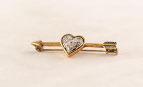 GOLD COLOURED METAL CUPID'S ARROW PIERCING A HEART set with six tiny diamonds, 3.7 gms gross