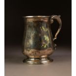 VICTORIAN SILVER TANKARD, of baluster form with leaf capped double scroll handle, 5? (12.7cm)