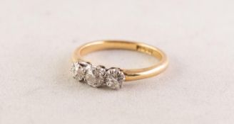 18ct GOLD RING, claw set with a row of three good, old cut round diamonds, each approximately 0.