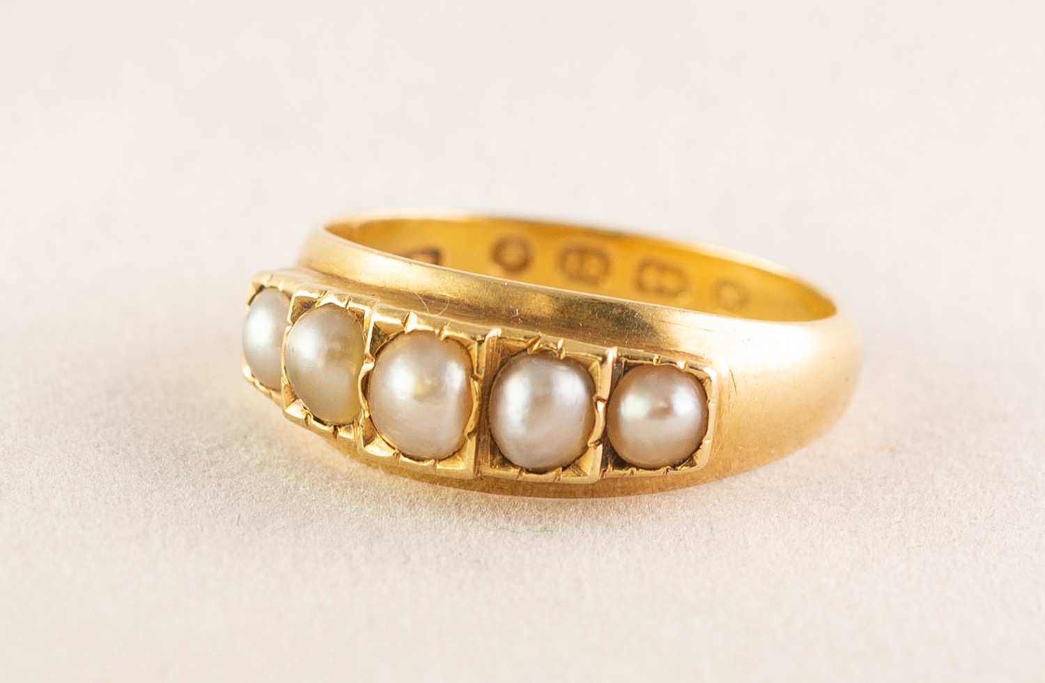 18ct GOLD RING, set with five half pearls, Birmingham 1871, 3.3gms, ring size L/M