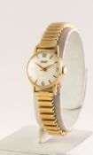 LADY'S TISSOT 14ct GOLD SWISS WRISTWATCH, with mechancial movement, silvered dial with four arabic