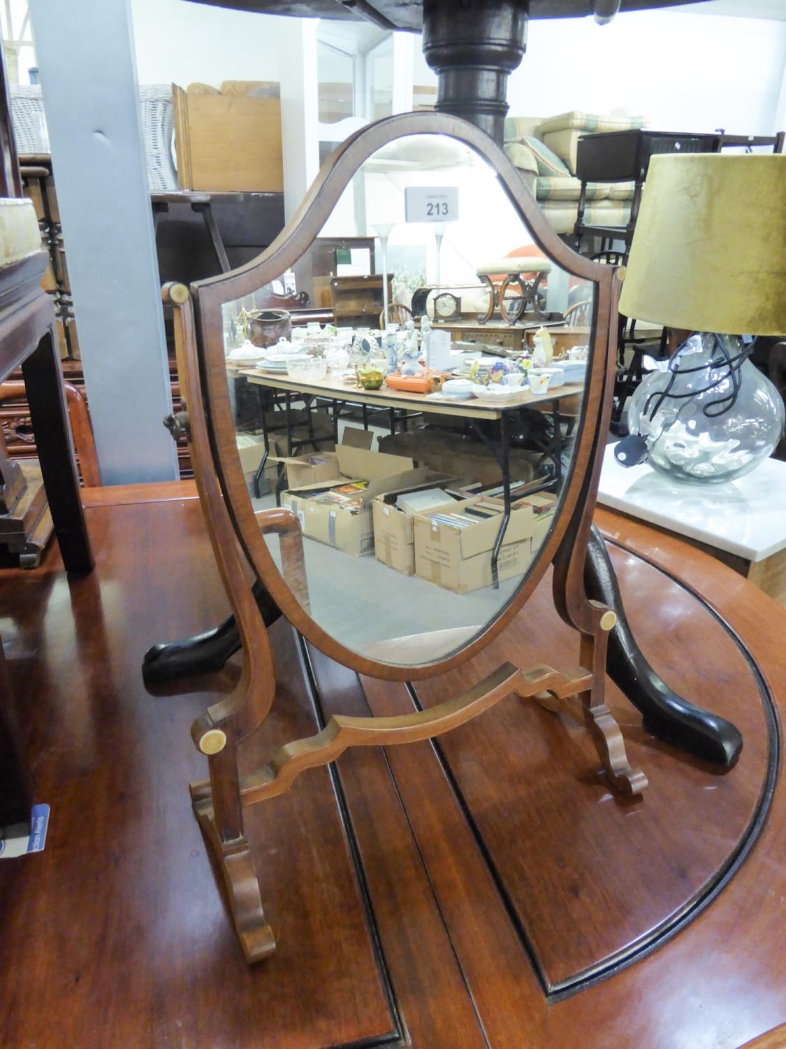 EDWARDIAN MAHOGANY CHEVAL TOILET MIRROR WITH SHIELD SHAPED PLATE AND DECORATED WITH TWO IVORY