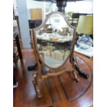 EDWARDIAN MAHOGANY CHEVAL TOILET MIRROR WITH SHIELD SHAPED PLATE AND DECORATED WITH TWO IVORY