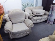 A MODERN THREE PIECE LOUNGE SUITE AND FOOTSTOOL, COVERED IN CREAM/GOLD FABRIC (4)