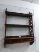 CHIPPENDALE STYLE MAHOGANY THREE TIER WALL SHELVES, WITH ROW OF THREE SHORT DRAWERS BELOW, HAVING