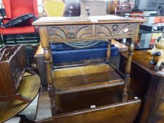 AN OAK SMALL HALL OR SIDE TABLE, WITH TWO DRAWERS WITH CARVED FRONTS UNDER PLATFORM, ON BALUSTER
