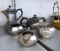 CRAFTSMAN FOUR PIECE PLANISHED PEWTER TEA SET OF ARTS AND CRAFTS FORM WITH STUDDED GIRDLE, TEAPOT