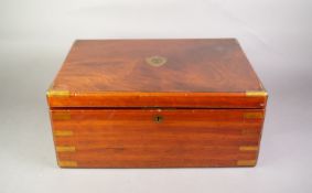 LATE VICTORIAN FIGURED MAHOGANY AND BRASS BOUND MILITARY CAMPAIGN CUTLERY CANTEEN, with two brass