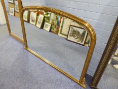 A GILT FRAMED OVERMANTEL WALL MIRROR