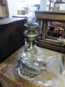 AN EDWARDIAN BRASS OIL LAMP (MINUS SHADE), ALSO A BRASS CANTED OBLONG SNUFF BOX WITH INDISTINCTLY