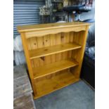 GOOD QUALITY PINE OPEN BOOKCASE, HAVING TWO SHELVES ON BUN FEET