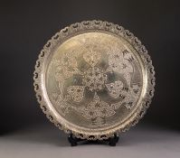 PERSIAN SILVER PLATED CIRCULAR TRAY with curved sides having pierced opposing C scroll pattern to